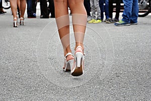 legs in high heels walking