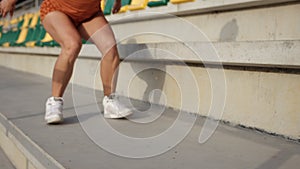 Legs jump close up. Fitness woman jumping outdoor in urban environment. Sport