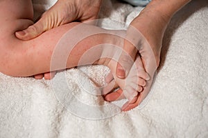 Legs of little child with red rash, closeup. Concept of babies allergies