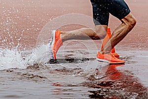 legs male athlete runner running steeplechase race