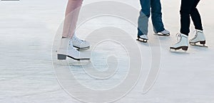 Legs of people skating