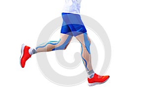 legs runner athlete in blue kinesiotaping on thigh