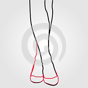 Legs of a woman wearing stilettos