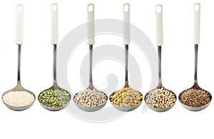 Legumes over spoons photo