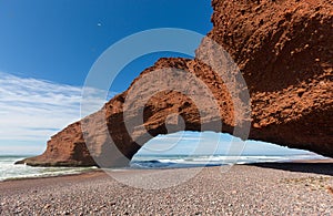 Legzira beach with arched rock in Morocco