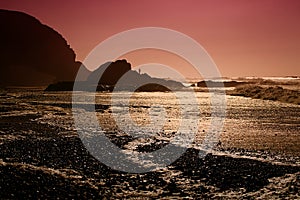 Legzira stone arches sunset lights, Atlantic Ocean, Morocco, Af