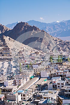 Leh town seen from above with many houses and mountains surrounded at Ladakh