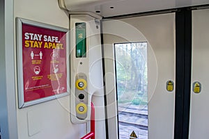 LEICESTER, ENGLAND- 3 April 2021: Coronavirus signage on a Crosscountry train amid the coronavirus pandemic