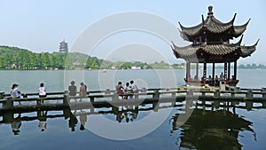 Leifeng Pagoda with stone bridge in West Lake