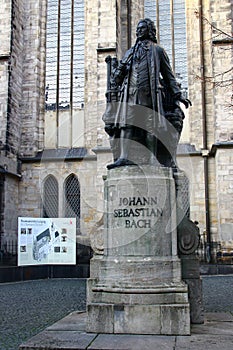 Leipzig, Germany - December 17, 2023: Monument to the famous German composer and organist Johann Sebastian Bach stands in front of