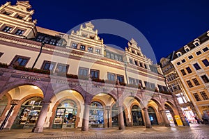 Leipzig, Germany - July 02, 2022: The city Center of the saxony metropolis at night. The old town hall or city hall illuminated in