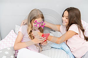 Leisure and fun. Social networks concept. Girls friends taking photo for social networks. Online stream vlog channel