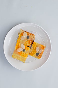 Lekkker Holland cake served with slices. photo
