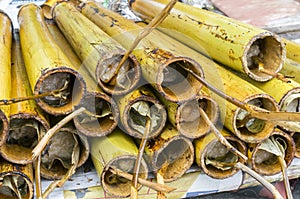 Lemang in a hollowed bamboo stick photo