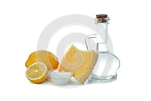 Lemon acid, lemons and sponge isolated on white background