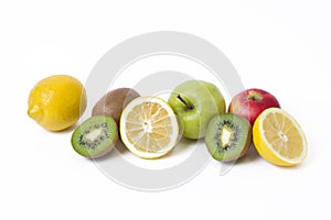 Lemon with apples and kiwi on white background. Kiwi with lemon on a white background. Fruits on a white background.