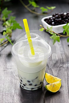 Lemon Boba Bubble Tea with fruits and crushed ice.