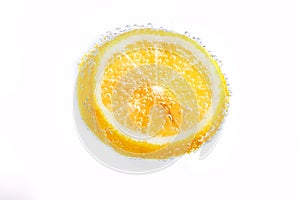 Lemon with bubbles in soda