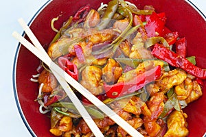 Lemon chicken with peppers and mange tout