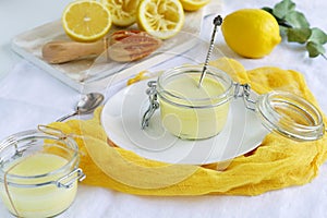 Lemon curd delicious and healthy dessert on a white yellow background. top view. flat lay