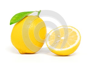 Lemon cut half with leaf isolated on white background