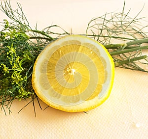Lemon and dill together on cutting board