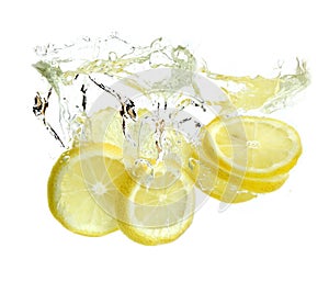 Lemon is dropped into water