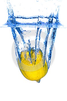 Lemon dropped in water