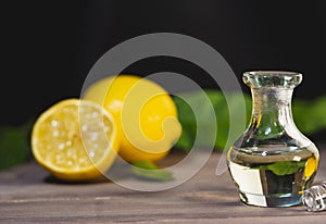 Lemon essential oil for massage and aromatherapy, copy space image