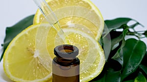 lemon essential oil in small bottles. selective focus.