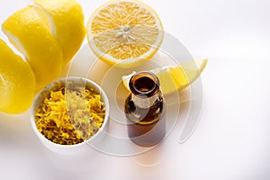 Lemon essential oil on a white background