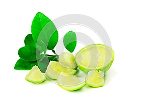 Lemon and green leaves with lime juice