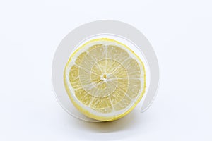 Lemon halved on white background