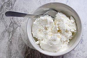 Lemon ice cream in a bowl. Top view and seletive focus