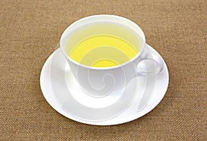 Lemon juice in cup and saucer