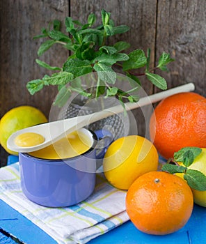 Lemon Kurd and citrus on the table. soft focus photo