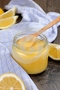 Lemon kurd - custard on fruit juice photo
