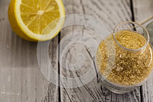 Lemon, lemonade , cane sugar on wooden background