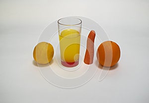 Lemon lemonade in glass glass glass orange carrot