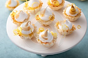 Lemon meringue tartlets in filo pastry shells