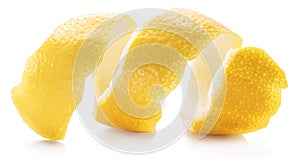 Lemon peel or lemon twist on white background. Close-up.