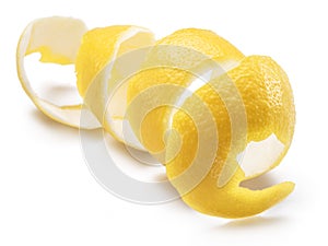 Lemon peel or lemon twist on white background. Close-up.