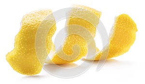 Lemon peel or lemon twist on white background. Close-up