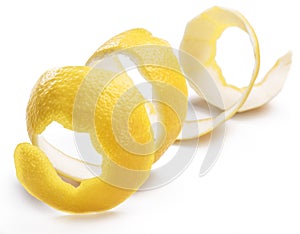 Lemon peel or lemon twist on white background. Close-up