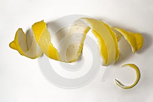 Lemon peel or lemon twist on white background. Close-up. Limon. photo