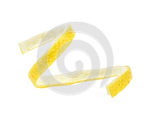 Lemon peel on white background, close-up. Citrus twist peel