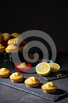 Lemon pie with fresh lemon background on wooden table, lemon cupcake