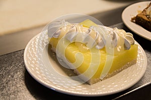 Lemon Pie on a White Plate