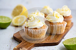 Lemon and poppy seed cupcakes with cheese cream frosting