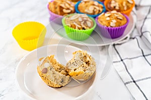 Lemon poppy seed muffins garnished with almond slivers